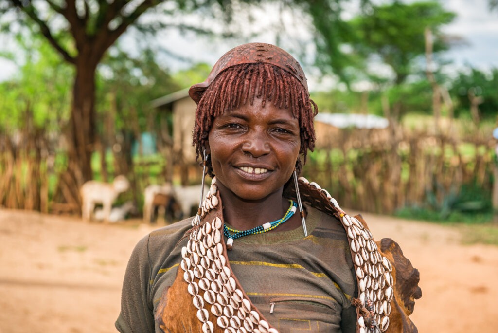 Mursi tribe woman with traditional lip plate in the Omo Valley, Ethiopia, cultural highlight of the Danakil Depression and Omo Valley 10 days tour